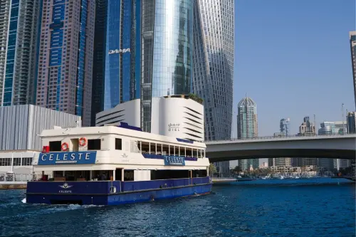 Celeste yacht gliding through Dubai Marinas blue waters.webp