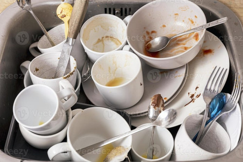pile of unwashed dirty dishes in the sink mess in the kitchen dirty kitchenware plates and mugs chao.jpg