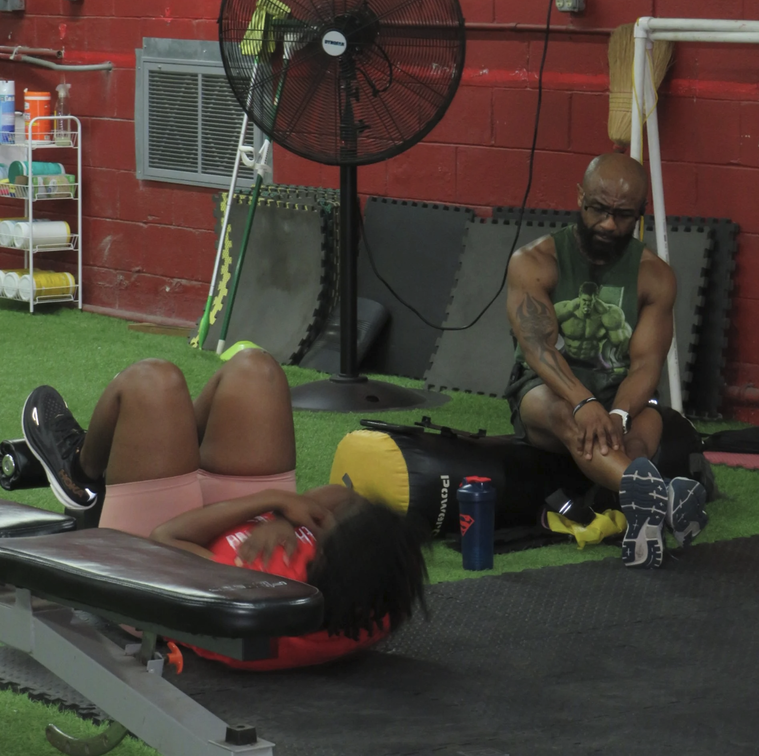 Training session at ThaBox showing hands-on coaching and movement work