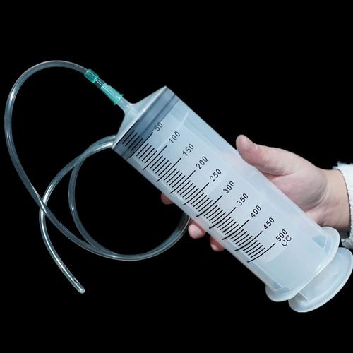 Syringe fullfilled with cum for inject in my womb