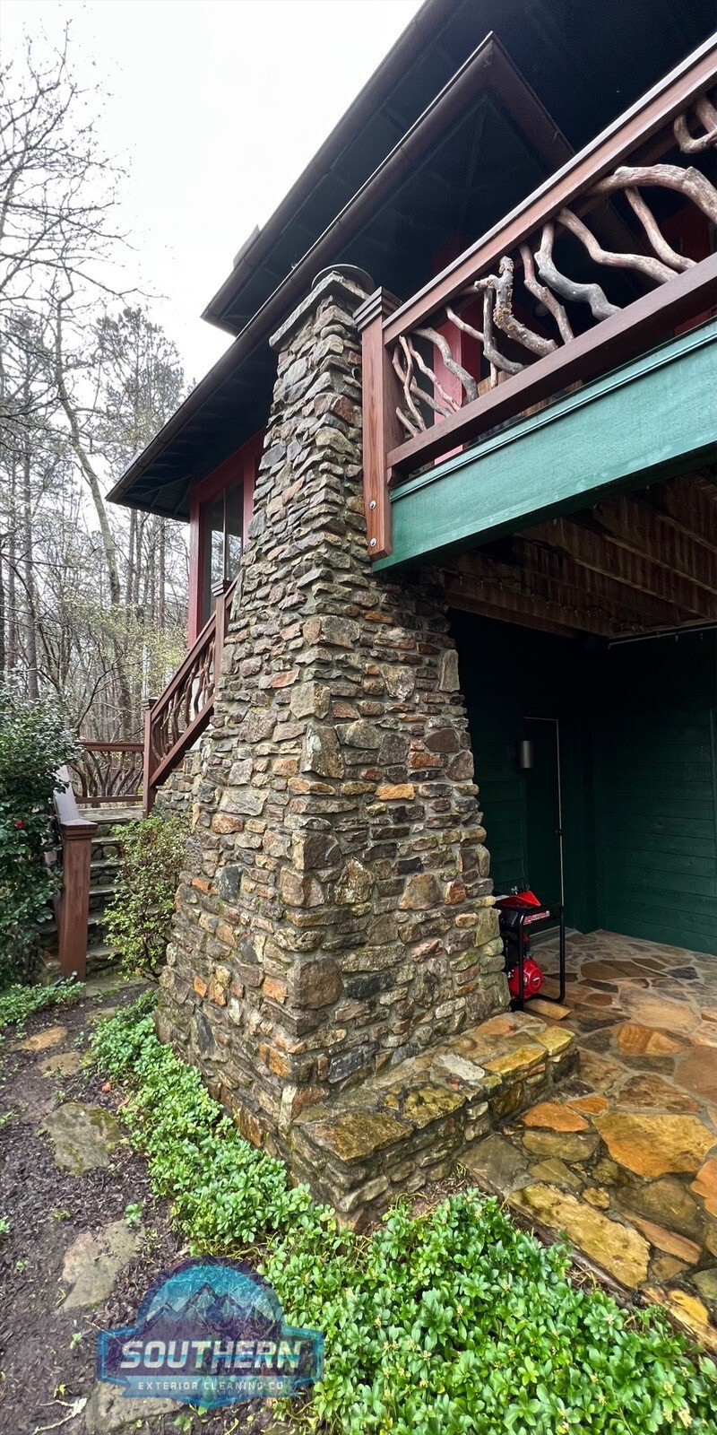 Stone column with moss and grime before pressure washing in Clayton Georgia