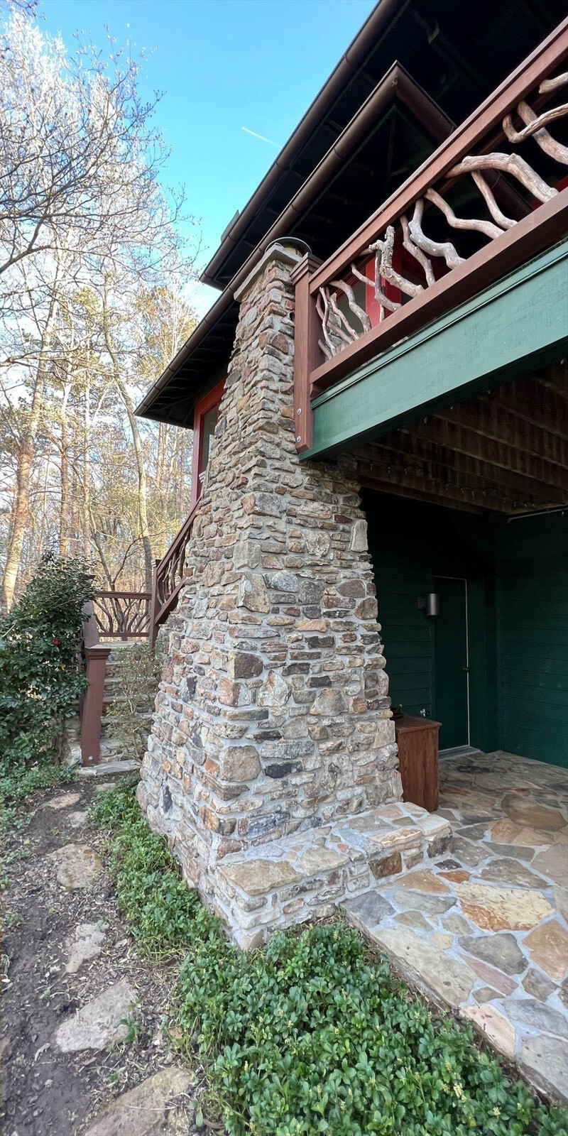 Stone column and exterior after pressure washing in Clayton GA by Southern Exterior Cleaning
