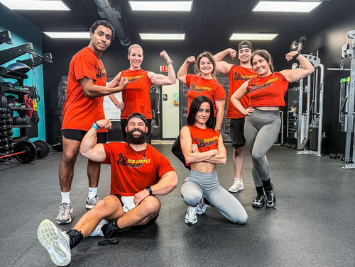 IBFit members posing together inside the fitness studio in Indian Land South Carolina
