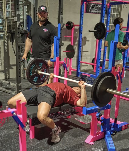 Michael Scullin coaching at a Charleston strength gym