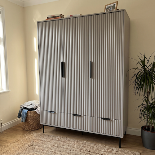 Why the DHS wardrobe with drawers and shelves works in our twin room.png