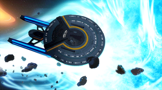 a gif of the USS Cerritos being hit by an asteroid