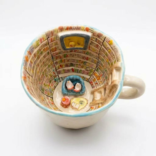 twin penguins library mug interior view 6a15a2e1dac6c 700.jpg