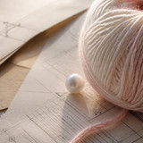 cream white crochet yarn on kraft paper