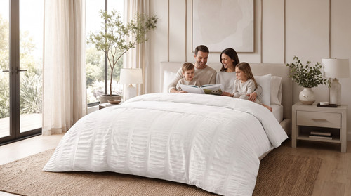 Family reading book on bed 202607221859.jpg