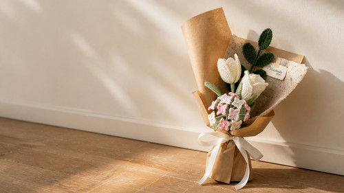 white crochet tulip bouquet kraft wrapping on floor.jpg