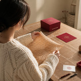 cozy knitwear lifestyle crafting red rose portrait