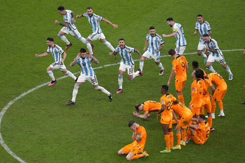 FILE - Argentina players celebrate at the end of the World Cup quarterfinal soccer match between the.jpg
