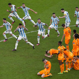 FILE - Argentina players celebrate at the end of the World Cup quarterfinal soccer match between the