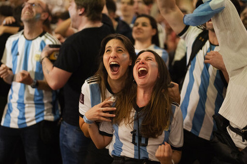 Argentina fans celebrate in a bar in Barcelona, Spain during the World Cup final soccer match betwee.jpg