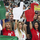 Iran supporters cheer prior to their FIFA World Cup 2022 group B match between Iran and USA at Al Th
