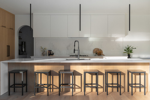 eagle residence pemberton kitchen island bar seating arched pantry.jpg
