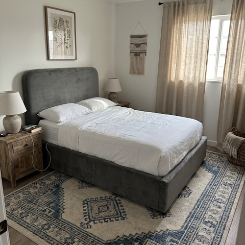 small double ottoman bed with grey velvet curved headboard.png