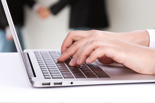 worker typing laptop 1232 1097.jpg