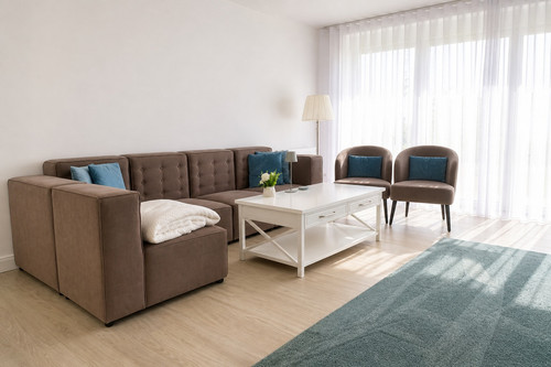 09 Wohnzimmer Sofa Sessel.jpg