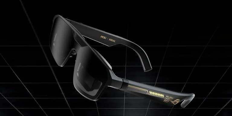 A black sunglasses with gold accents