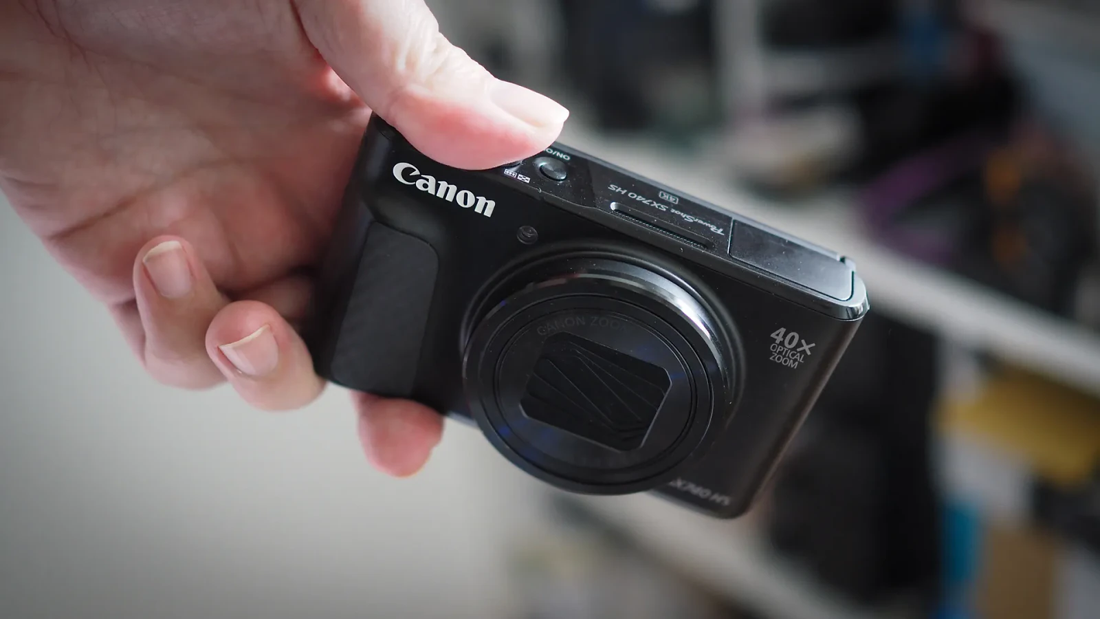 Photographer James Artaius holding the Canon PowerShot SX740 HS