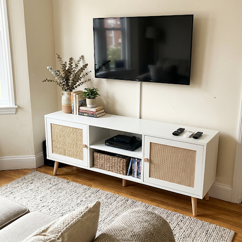 Our rattan tv unit with storage ended the cable tangle in the lounge.png