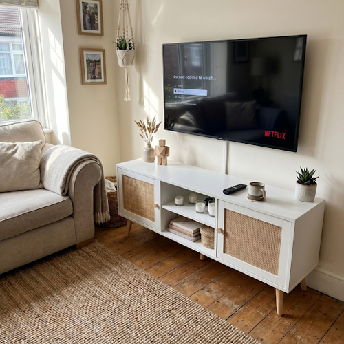Our white tv unit survives three boys and a Labrador in the family room.png