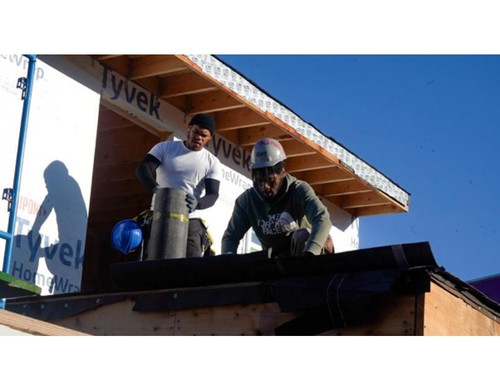 Roofing students practicing skilled trades.jpg