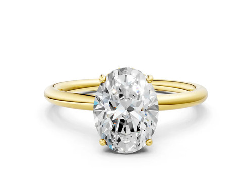 Yellow Gold Oval Cut Diamond Solitaire Ring with Four Prong Setting.jpg