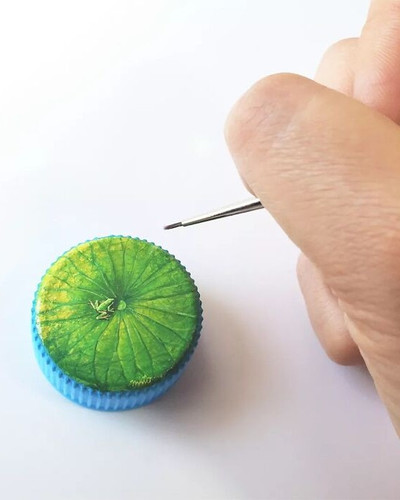 This Artist Turns Plastic Bottle Caps Into Tiny Hand Painted Masterpieces 69847264220db 700.jpg