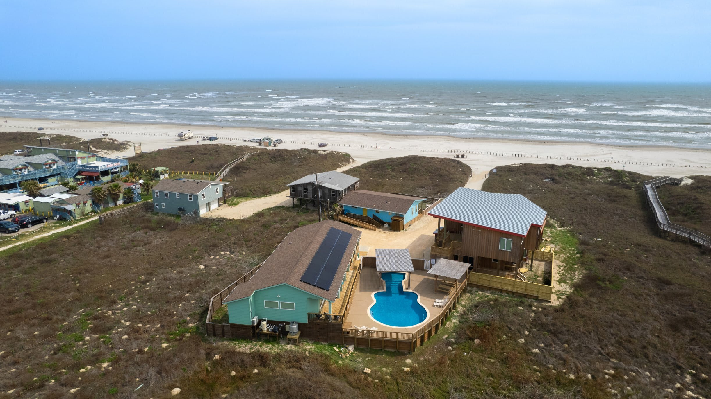 Aerial — Property Overview with Pool, Beach Access & Gulf Views