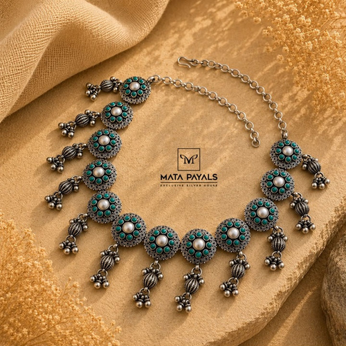 Handcrafted Oxidised Necklace with Turquoise Accents.png