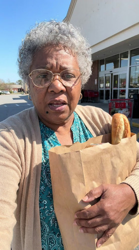 002 loretta bags arms up.jpg