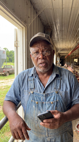 24 ar poultry farmer b up.jpg