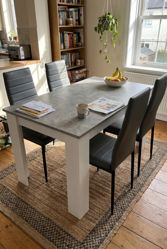 Grey marble dining table and 4 chairs from DHS with white block legs.png