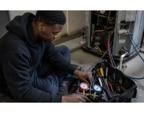 A HVAC Technician at HVAC service site.jpg