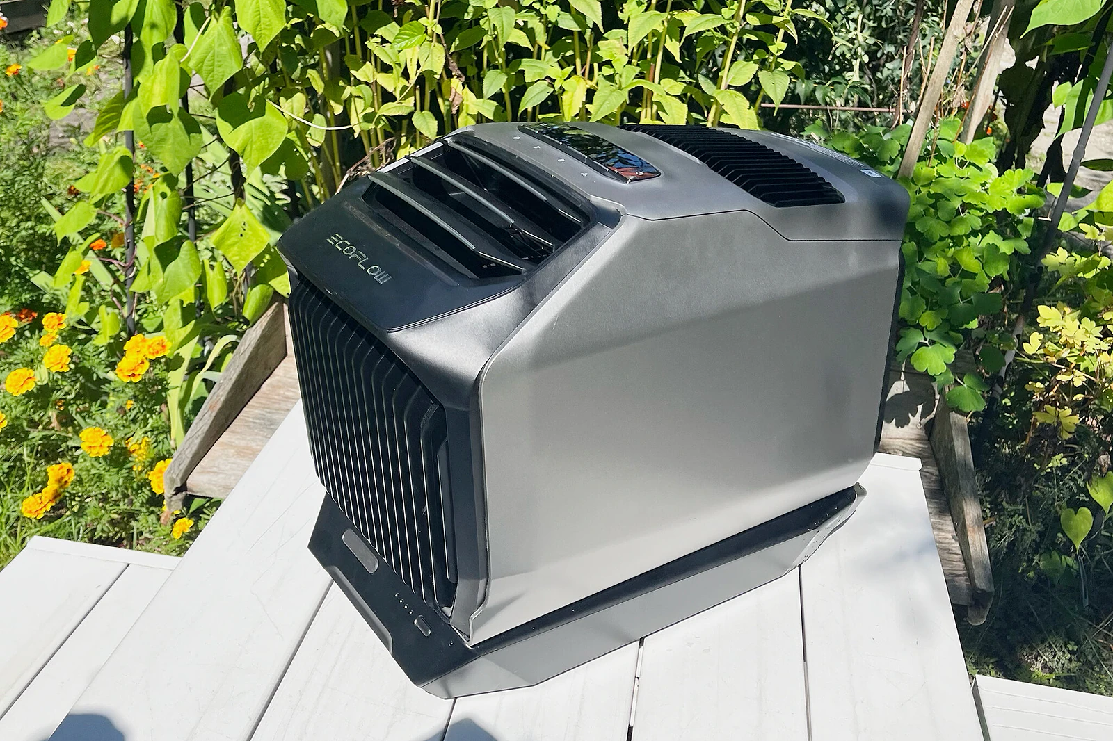 The EcoFlow Wave 2 cordless air contiditioner, in an outdoor environment.