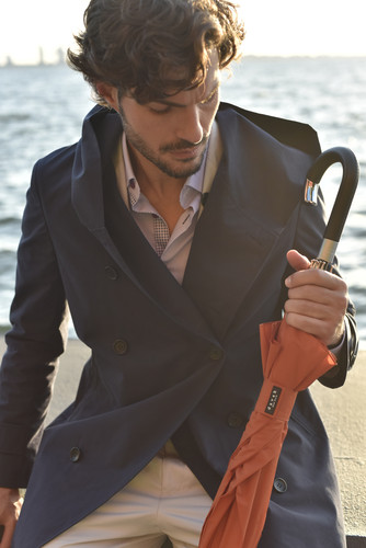 navy trenchcoat orange umbrella waterfront.jpg