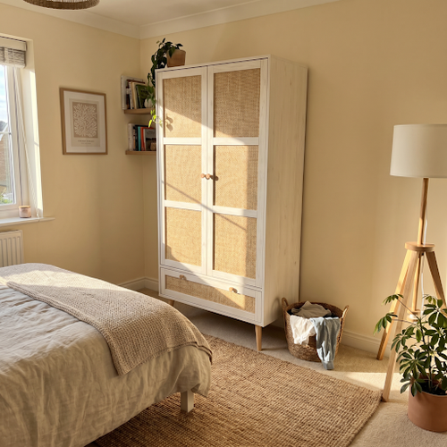 Our 2 door rattan wardrobe finally tamed the Victorian dressing room.png