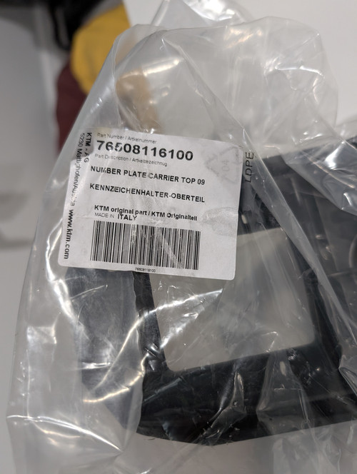76508116100 number plate carrier label.jpg