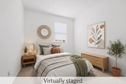 santa gloria bedroom three staged.jpg
