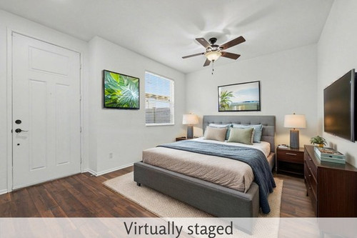 santa gloria primary bedroom staged.jpg