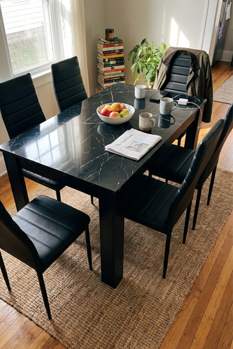 Black marble dining table and 6 chairs from DHS seen from above.png