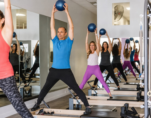 Overhead Medicine Ball Pilates Class.jpg