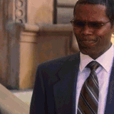 tragic said by a dark skinned older black man shaking his head in shame and or dissapointment.gif
