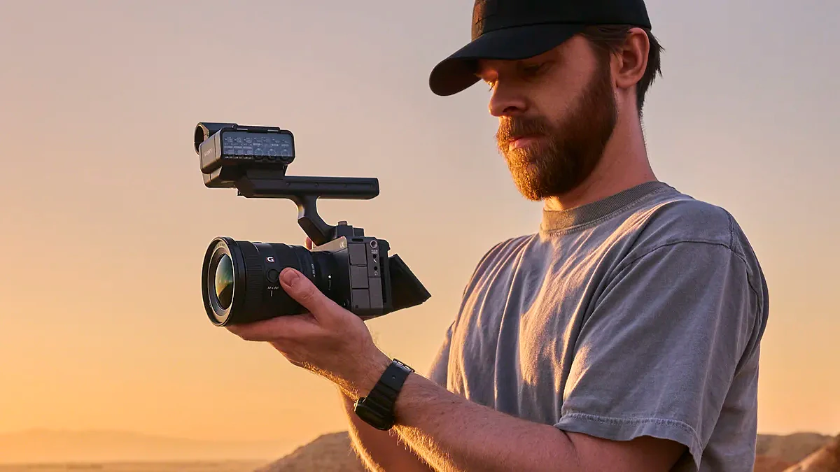 Videographer holding a Sony FX5