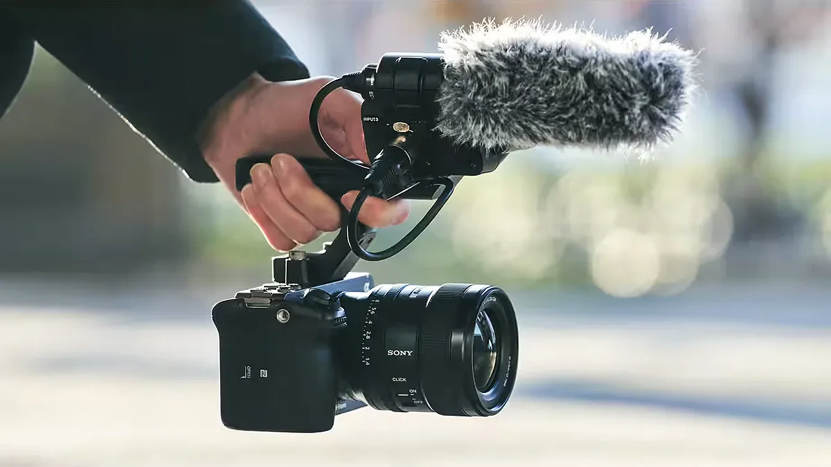 Videographer holding a Sony FX3