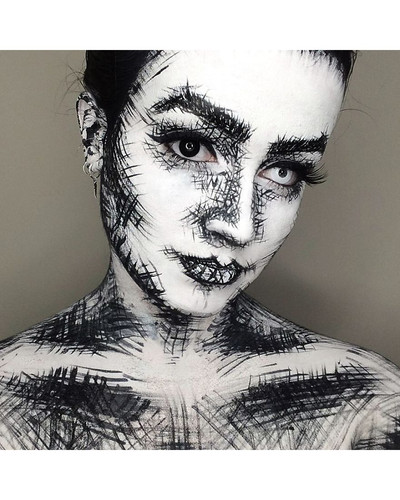 Artist uses his face as a canvas to paint our pop culture 5f1543b7b574b 880 bordered.jpg