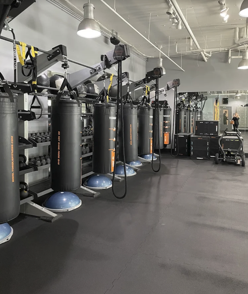 Pro Fit Training Gym kickboxing bags and conditioning space in Seattle