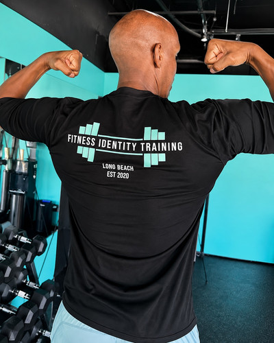 Flexing in a Turquoise Gym.jpg